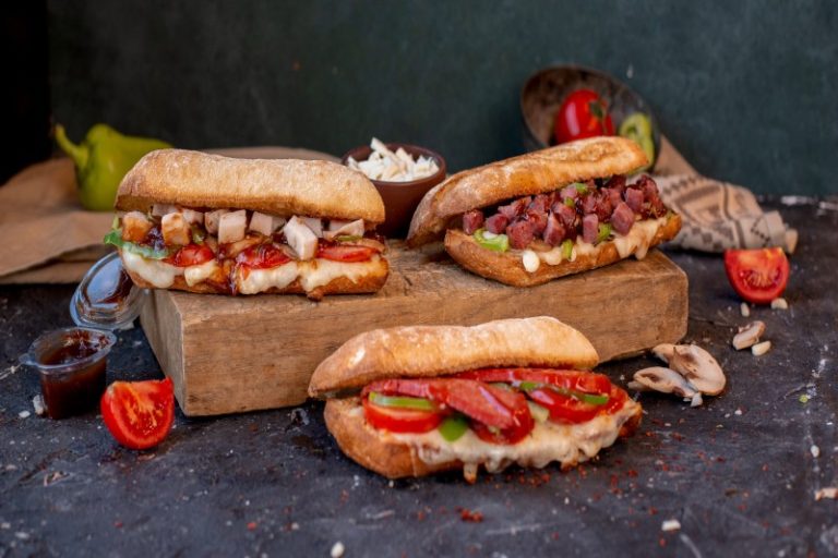 three-various-baguette-sandwiches-with-mixed-foods-stone-table (1)