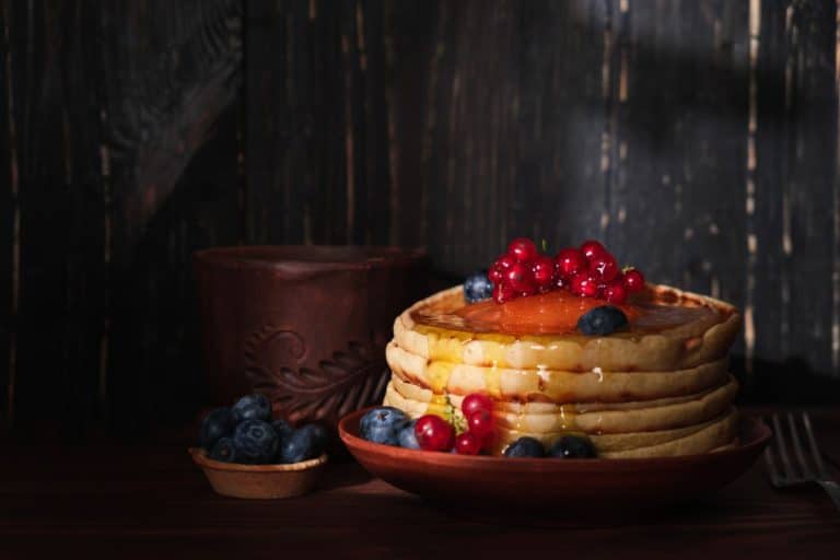 sweet-pancakes-blueberry-redcurrant-topping-homemade-pancakes-with-berries-coconut-flakes (1)